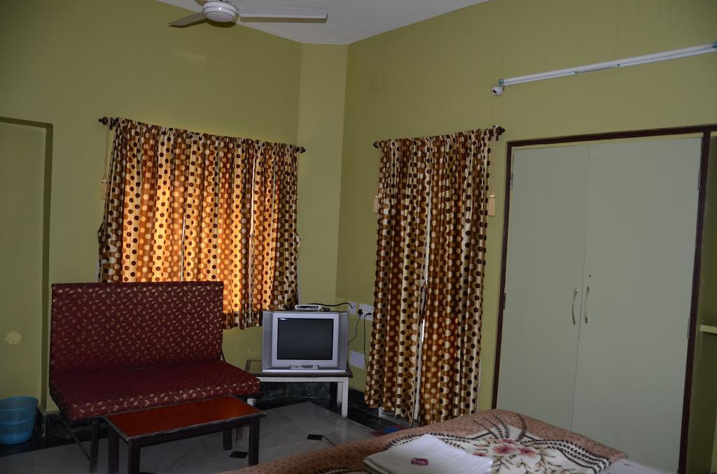 Kim Lawn Guest House Калькутта Номер фото
